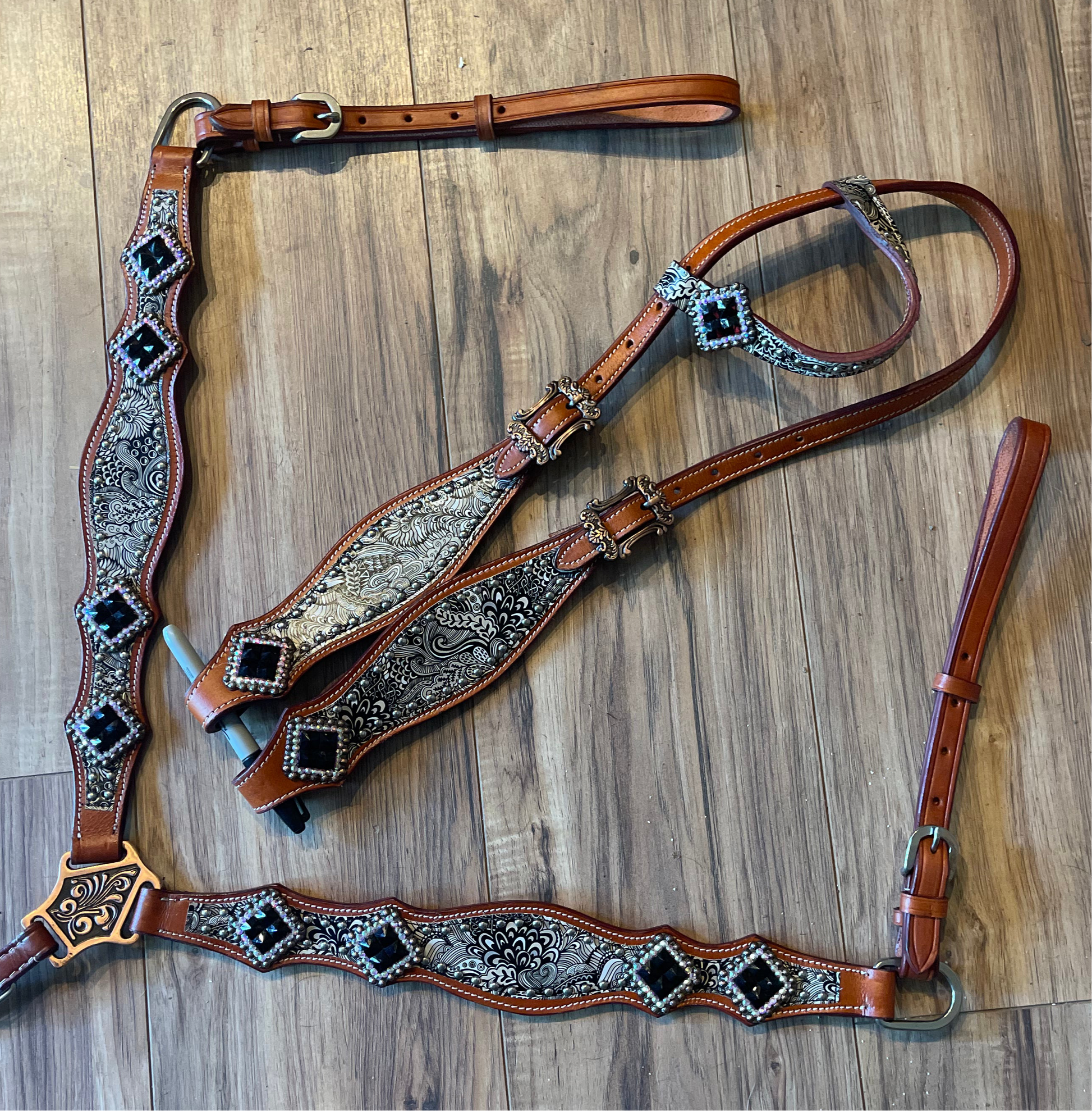 Brown leather tack set with black &white accents