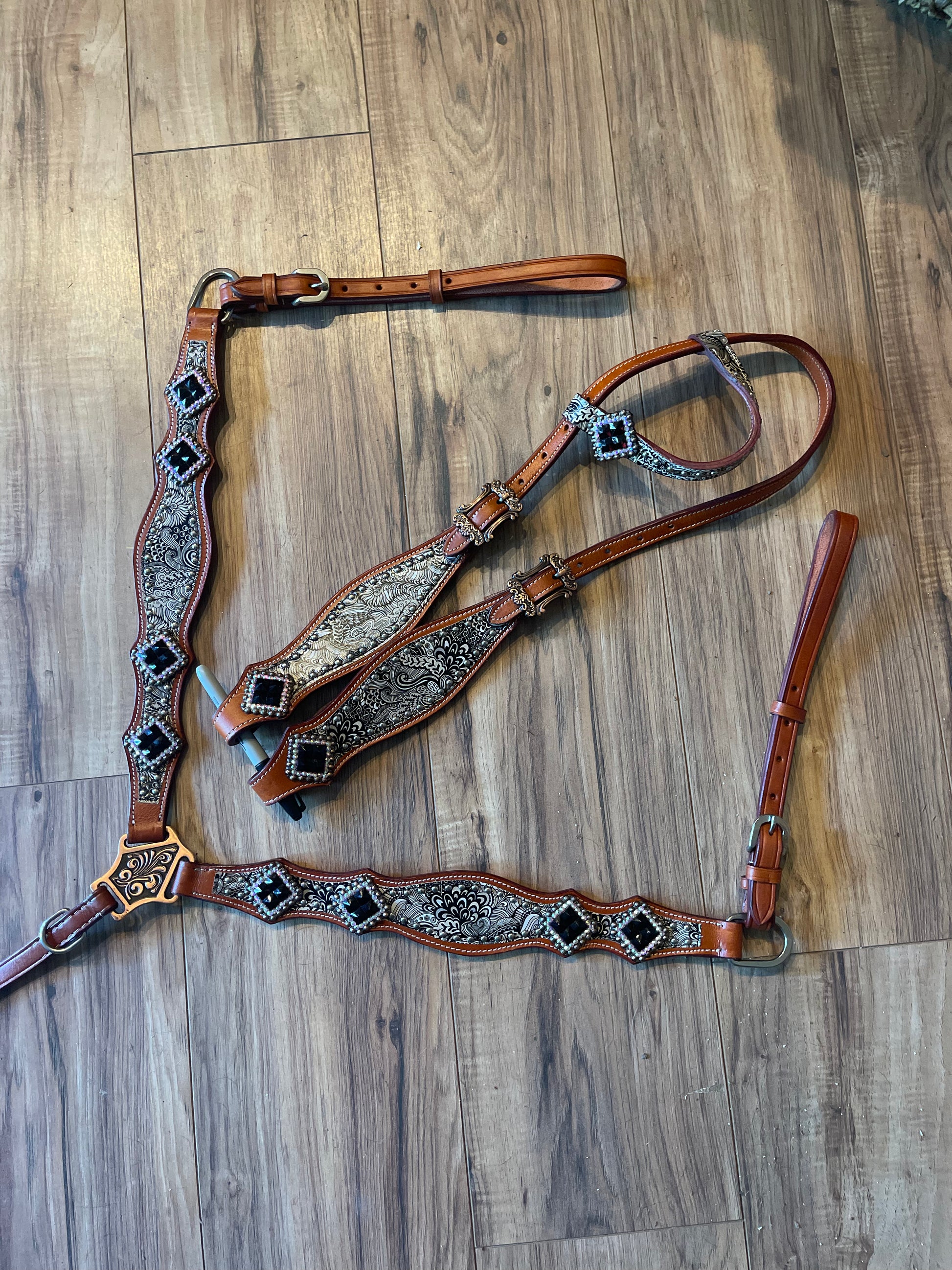 Brown leather tack set with black &white accents