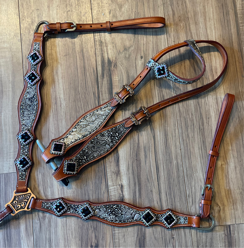 Brown leather tack set with black &white accents