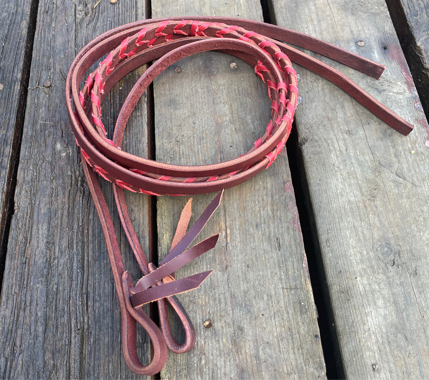 Brown with red lace split reins