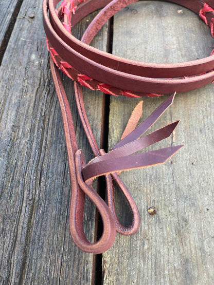 Brown with red lace split reins